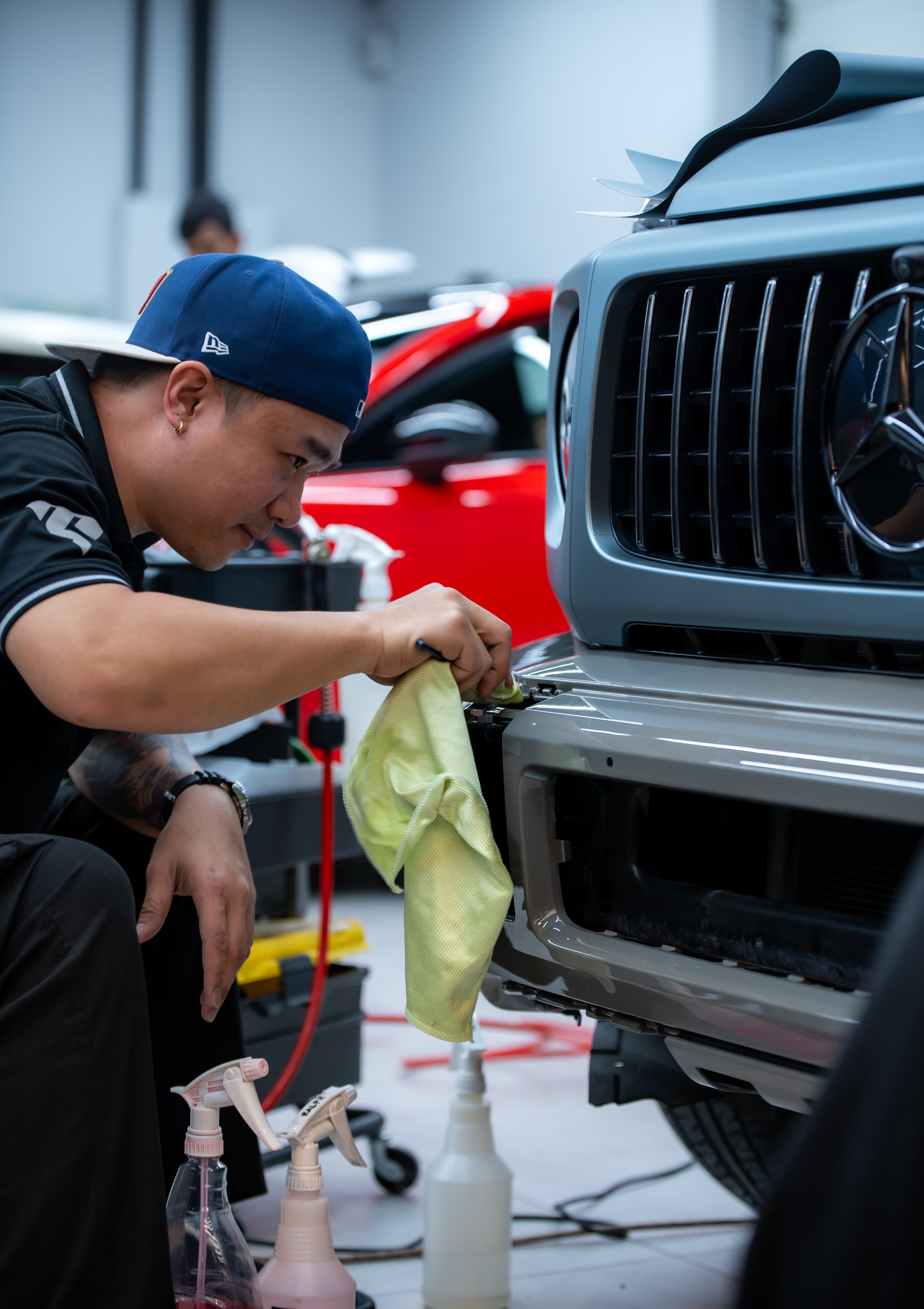 Technician applying professional detailing products
